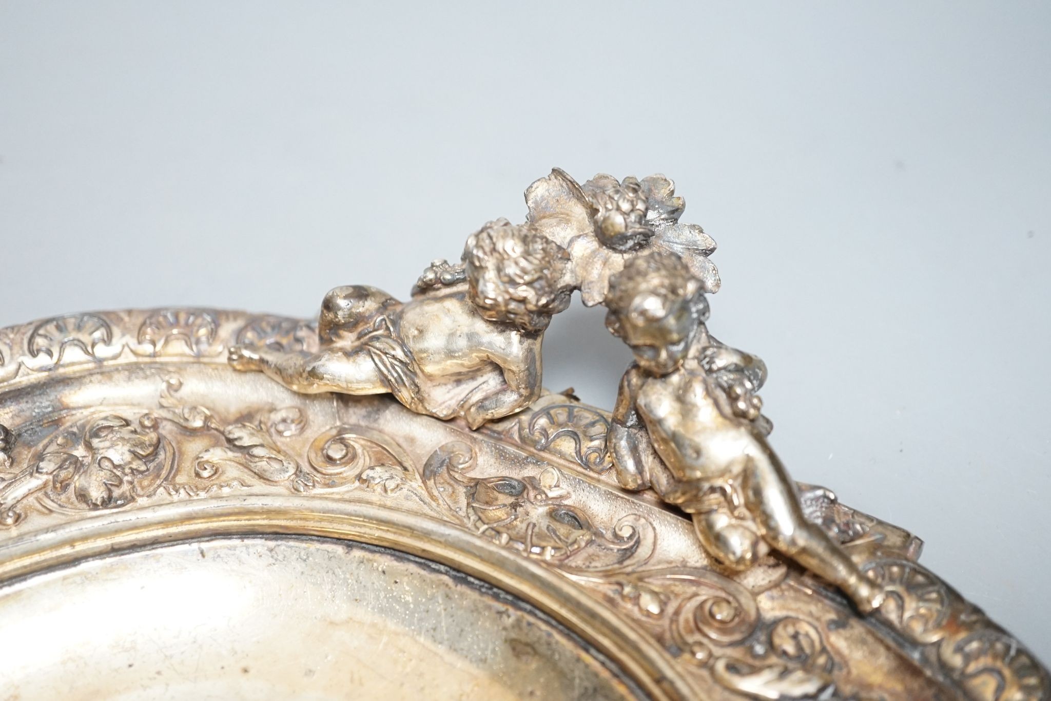 A Victorian cherub handled plated tray 40cm